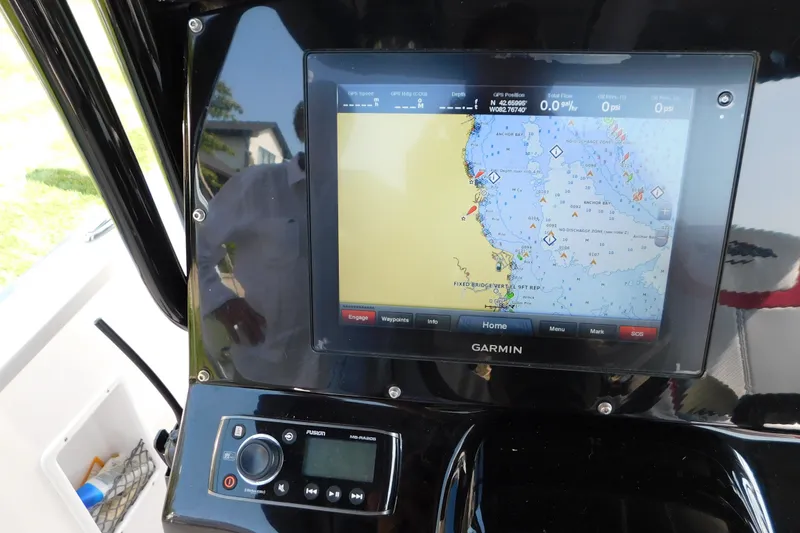 Slide: The Image of Garmin navigation system on 2017 Sunsation 32 CCX boat dashboard. - 33