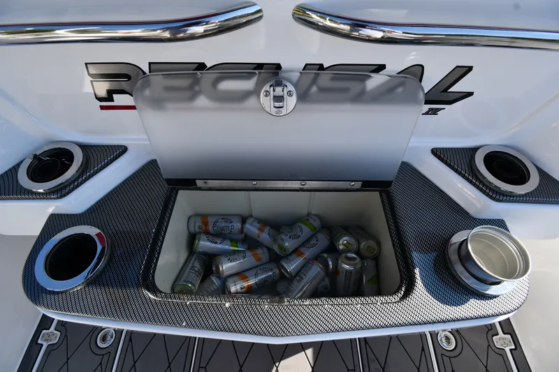 Slide: The Image of 2017 Sunsation 32 CCX boat cooler with canned beverages on deck. - 27