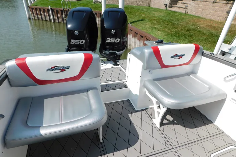 Slide: The Image of 2017 Sunsation 32 CCX boat interior with dual 350 engines and cushioned seating. - 38