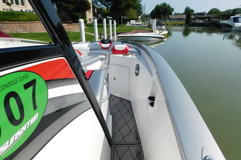 Slide: The Image of 2017 Sunsation 32 CCX boat docked, featuring sleek design and modern interior. - 14