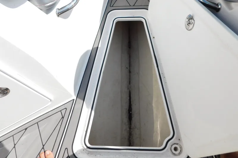 Slide: The Image of Open storage compartment on 2017 Sunsation 32 CCX boat deck. - 20