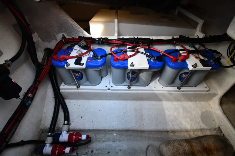 Slide: The Image of Battery compartment of 2017 Sunsation 32 CCX boat with Optima batteries and wiring. - 29