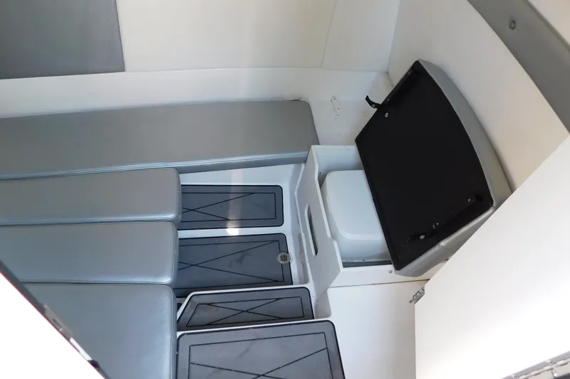 Slide: The Image of 2017 Sunsation 32 CCX cabin interior with seating and compact toilet. - 43