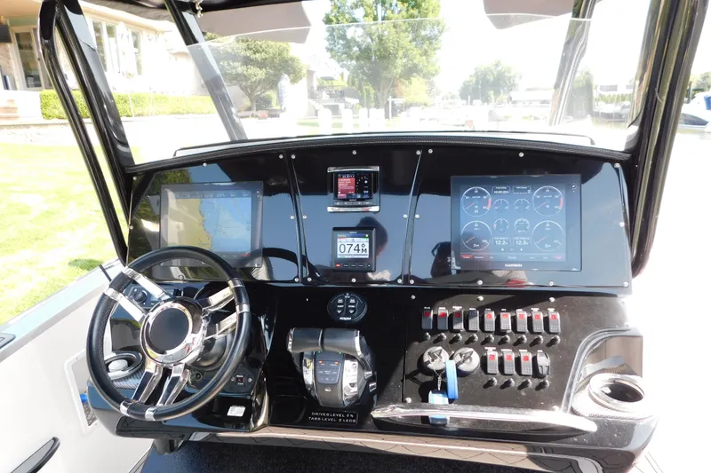 Slide: The Image of 2017 Sunsation 32 CCX dashboard with advanced navigation and control systems. - 29