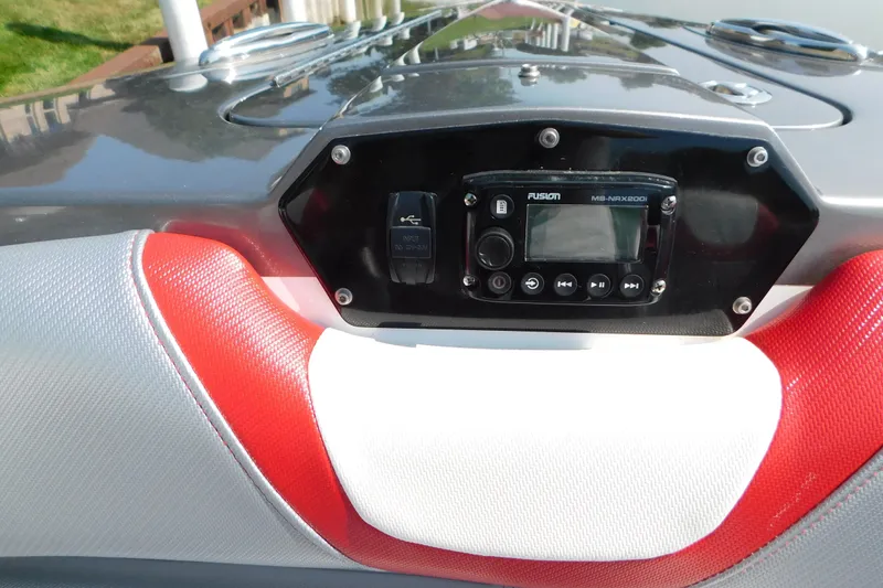 Slide: The Image of 2017 Sunsation 32 CCX boat dashboard with Fusion MS-NRX200i stereo system. - 18