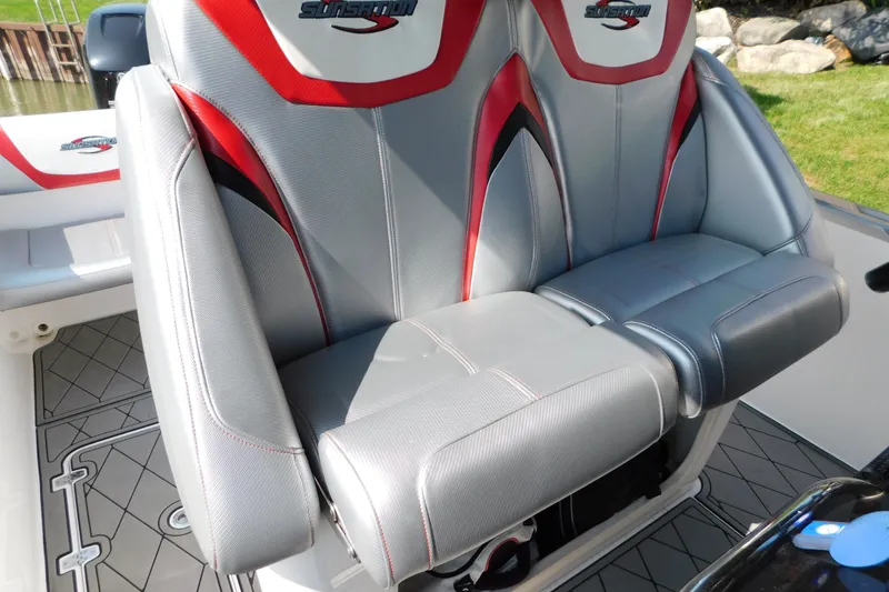 Slide: The Image of 2017 Sunsation 32 CCX boat seats with red and gray upholstery, showcasing sleek design. - 36