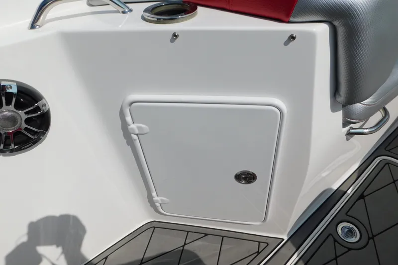 Slide: The Image of 2017 Sunsation 32 CCX boat interior with speaker and storage compartment. - 21