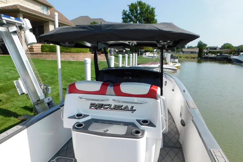 Slide: The Image of 2017 Sunsation 32 CCX boat docked by a lakeside home. - 41