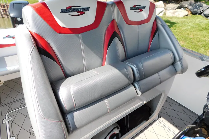 Slide: The Image of 2017 Sunsation 32 CCX boat seats with red and gray upholstery, showcasing luxury design. - 37