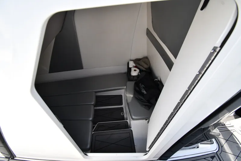 Slide: The Image of 2017 Sunsation 32 CCX cabin interior with seating and storage space. - 32