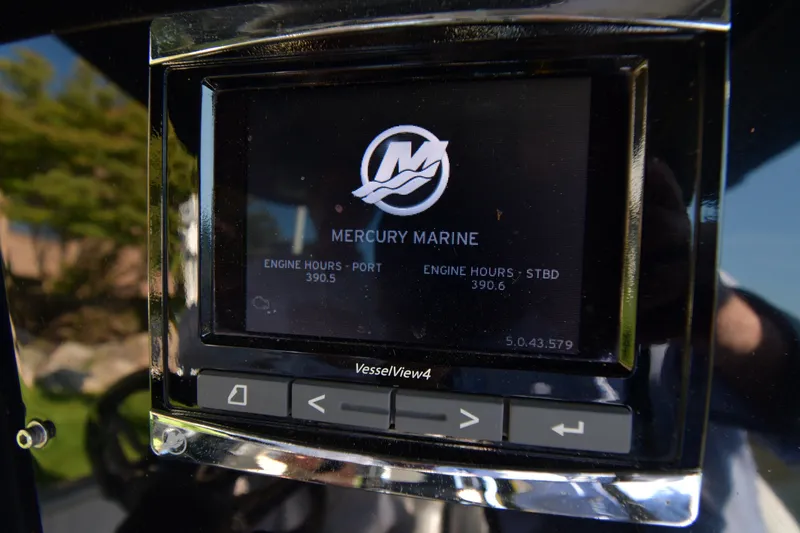 Slide: The Image of Display screen on 2017 Sunsation 32 CCX showing Mercury Marine engine hours. - 11