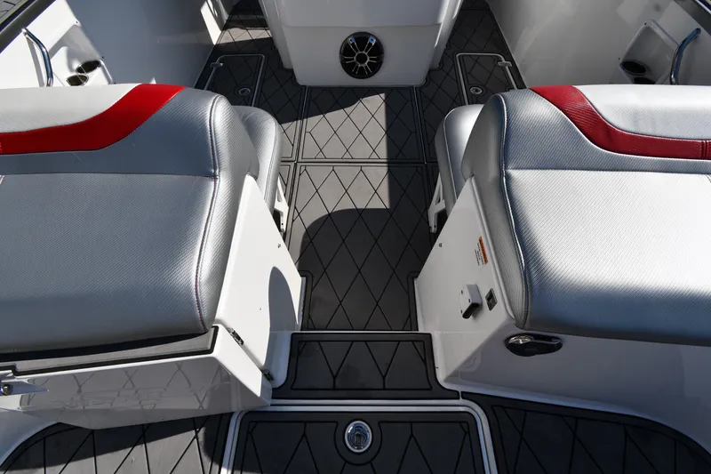 Slide: The Image of 2017 Sunsation 32 CCX boat interior with gray and red seating, diamond-patterned flooring. - 31