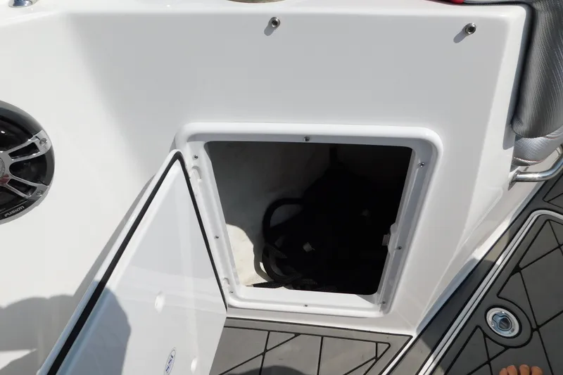 Slide: The Image of Open storage compartment on 2017 Sunsation 32 CCX boat deck. - 22