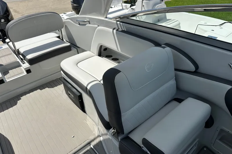 Slide: The Image of 2021 Crownline Eclipse E305 XS boat interior with luxurious seating and modern design. - 13