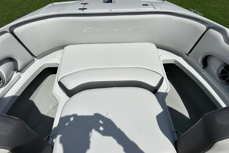 Slide: The Image of 2021 Crownline Eclipse E305 XS boat interior with white cushioned seating. - 37