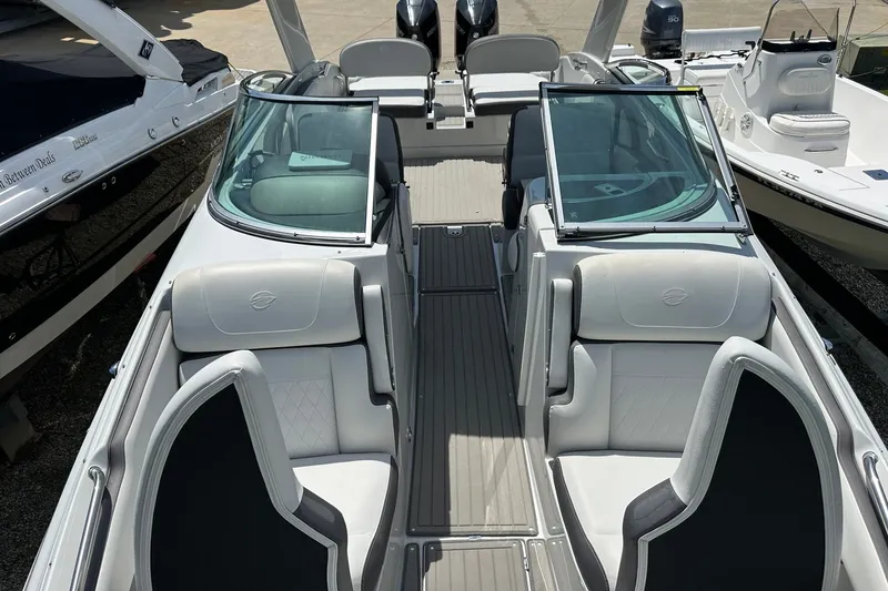 Slide: The Image of 2021 Crownline Eclipse E305 XS boat interior with sleek seating and modern design. - 29