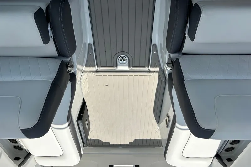 Slide: The Image of 2021 Crownline Eclipse E305 XS boat interior with sleek seating and modern design. - 18