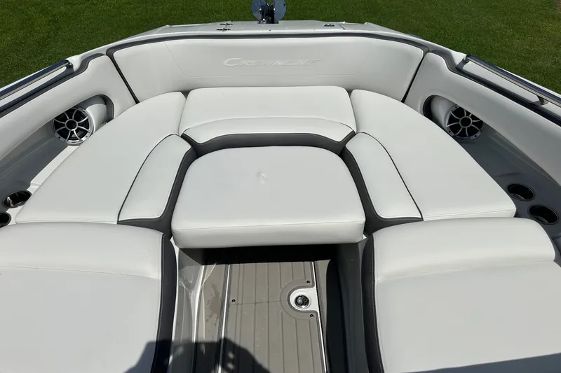 Slide: The Image of 2021 Crownline Eclipse E305 XS boat interior with white cushioned seating. - 35