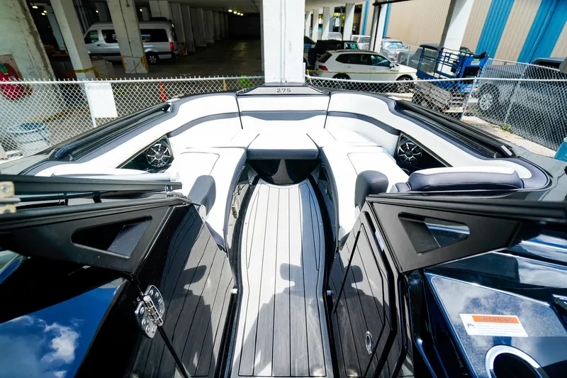 Slide: The Image of 2025 Yamaha Boats 275SD interior with sleek seating and modern design. - 20