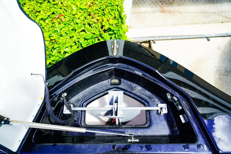 Slide: The Image of Open anchor compartment of 2025 Yamaha Boats 275SD, showcasing modern design and functionality. - 22