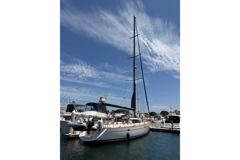 Slide: The Image of Sailboat docked at marina, 2003 Farr 50 Pilot House under clear sky. - 8