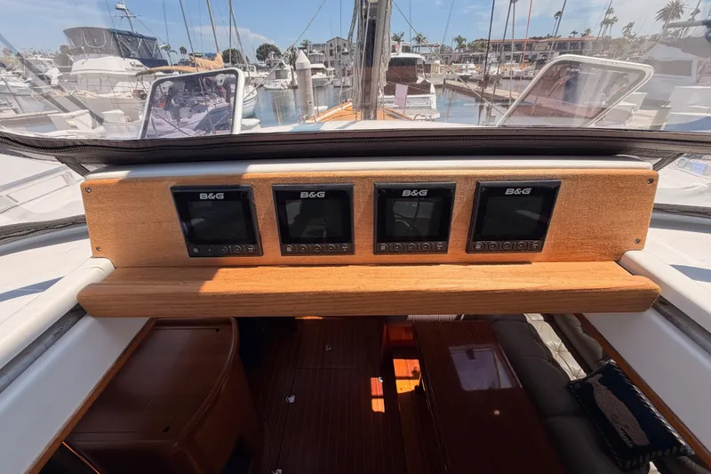 Slide: The Image of Interior view of 2003 Farr 50 Pilot House yacht with navigation instruments. - 53