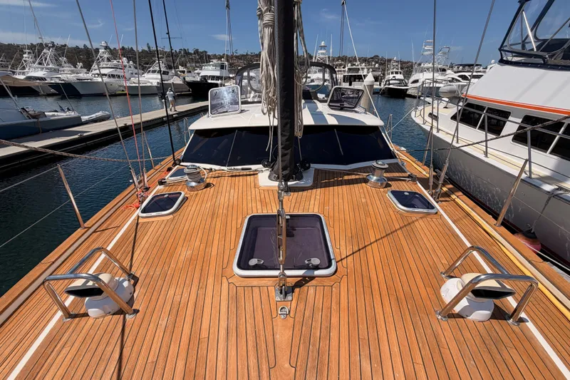 Slide: The Image of Deck view of 2003 Farr 50 Pilot House yacht docked at marina. - 30
