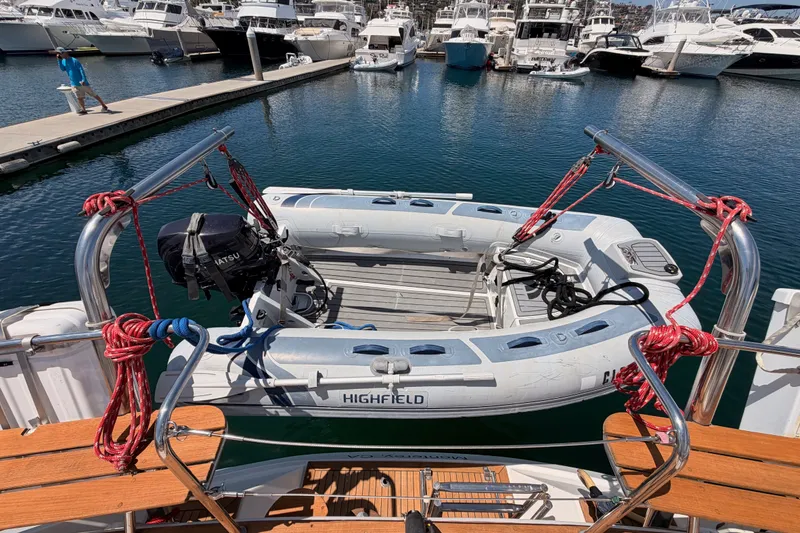 Slide: The Image of Inflatable dinghy on Farr 50 Pilot House yacht, docked in marina, 2003 model. - 38