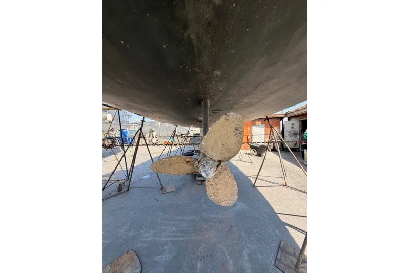 Slide: The Image of Underwater view of 2003 Farr 50 Pilot House propeller in dry dock. - 143