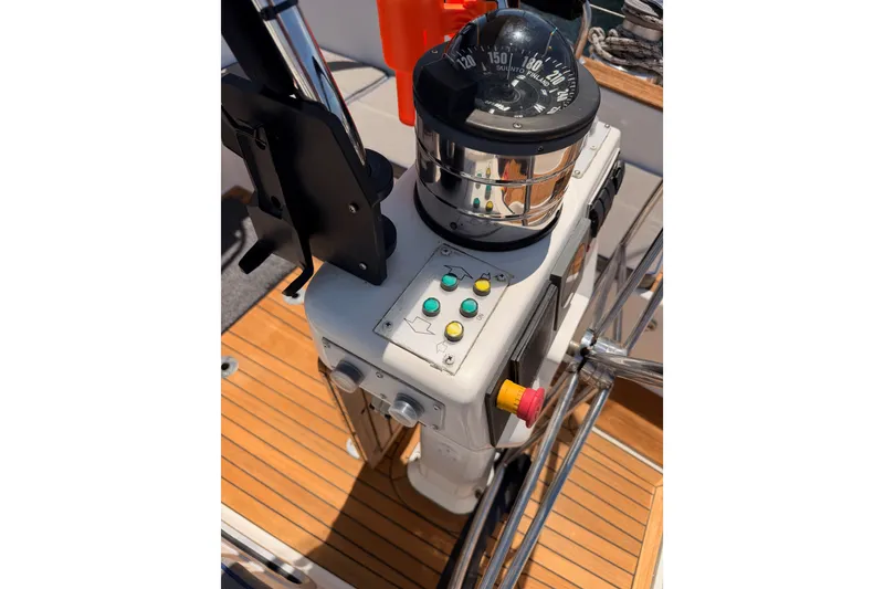Slide: The Image of Control panel and compass on a 2003 Farr 50 Pilot House yacht. - 50