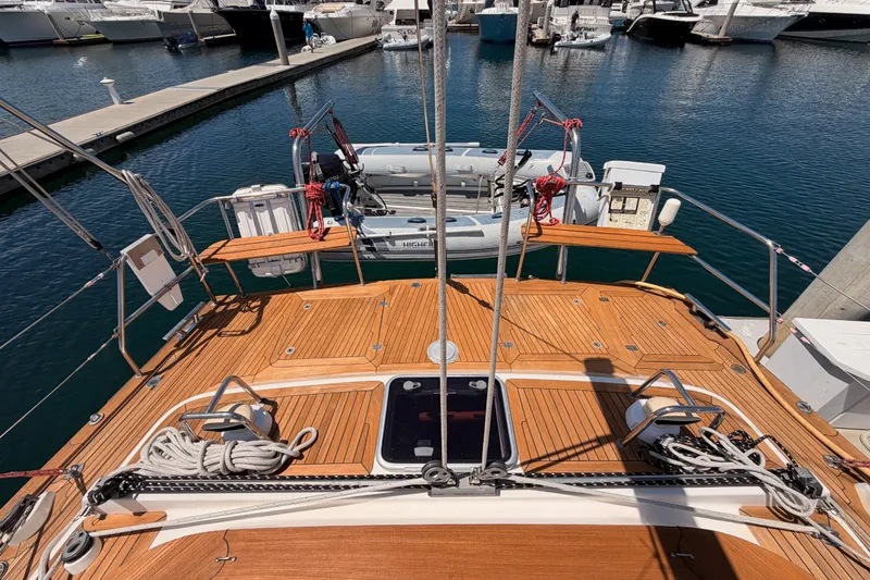 Slide: The Image of Deck view of 2003 Farr 50 Pilot House yacht docked at marina. - 36