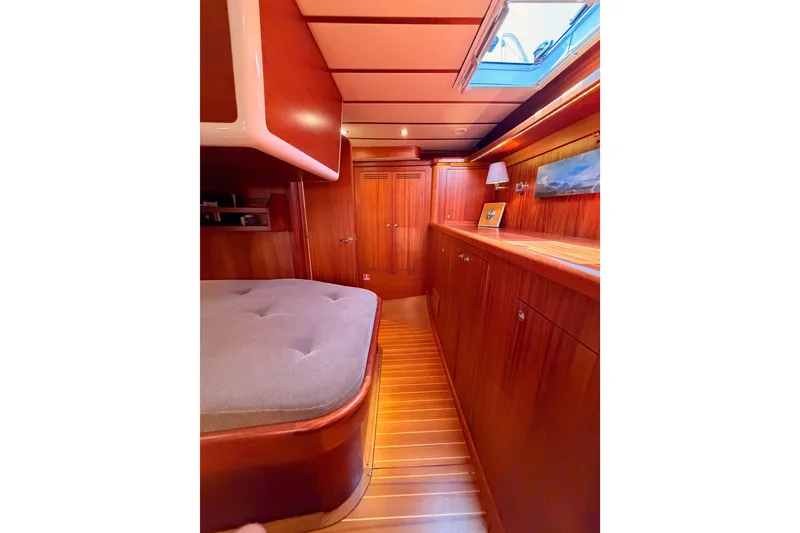Slide: The Image of Luxurious wood interior of 2003 Farr 50 Pilot House yacht cabin with skylight. - 110