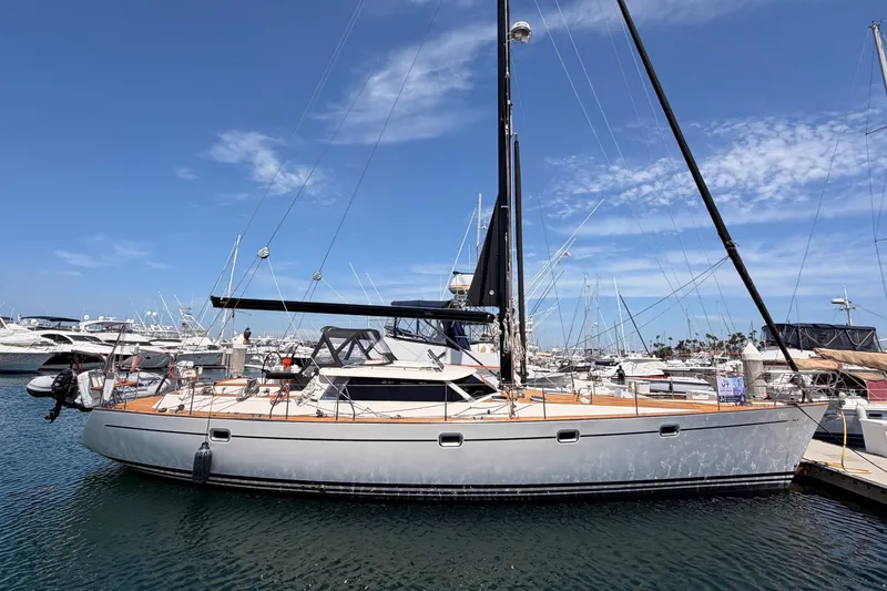 Slide: The Image of Sailboat docked at marina, 2003 Farr 50 Pilot House under clear blue sky. - 5
