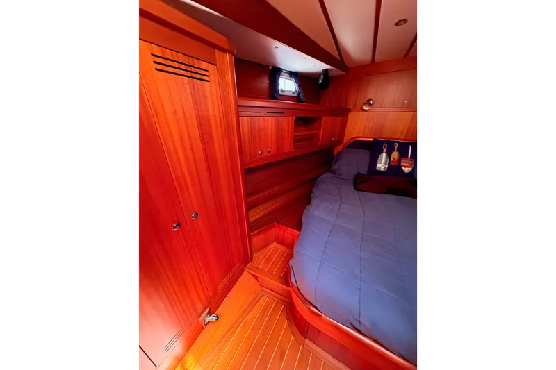 Slide: The Image of Luxurious wooden cabin interior of 2003 Farr 50 Pilot House yacht. - 86