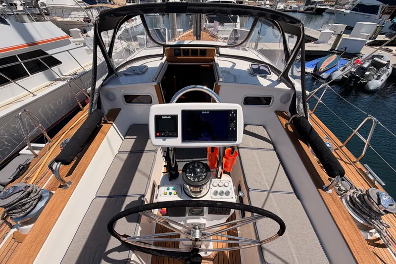 Slide: The Image of Cockpit of 2003 Farr 50 Pilot House yacht with navigation equipment and steering wheel. - 48