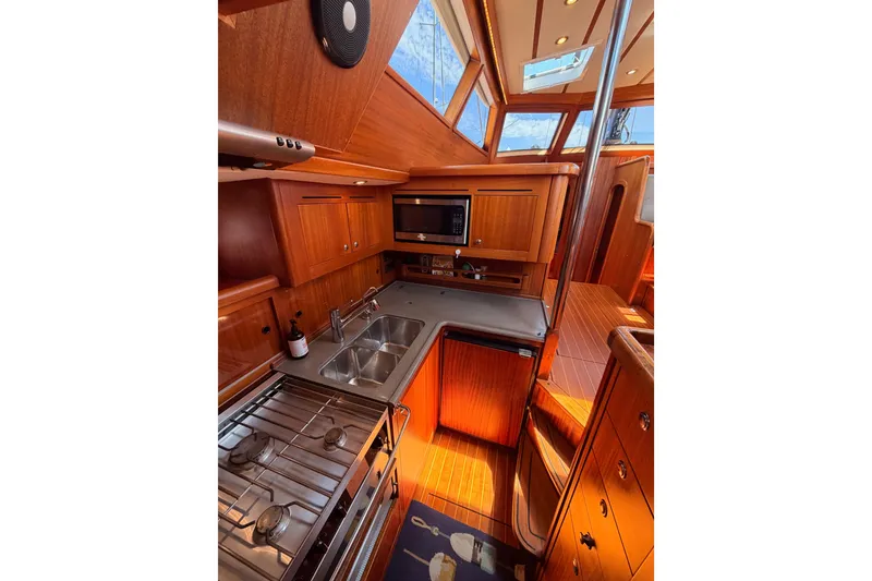 Slide: The Image of Luxurious 2003 Farr 50 Pilot House yacht interior with modern kitchen amenities. - 97
