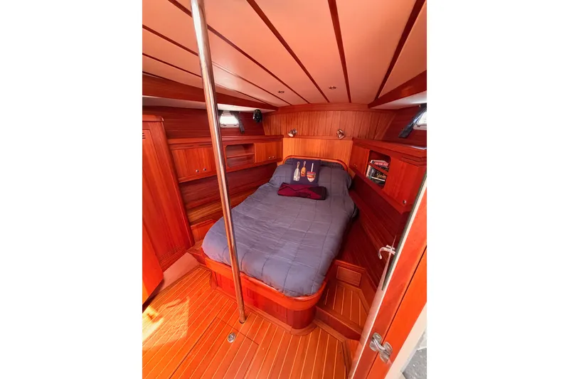 Slide: The Image of Luxurious wood-finished cabin interior of 2003 Farr 50 Pilot House yacht. - 92