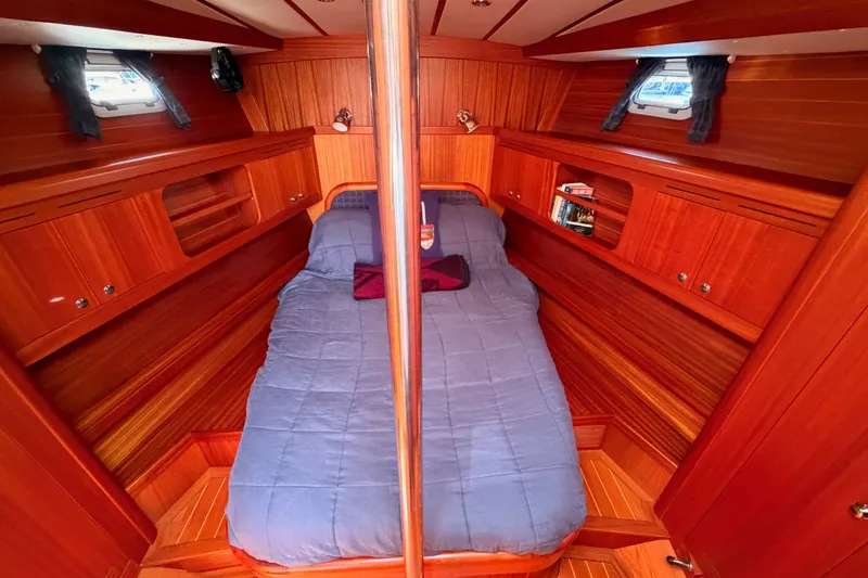 Slide: The Image of Luxurious wooden cabin interior of 2003 Farr 50 Pilot House yacht. - 83