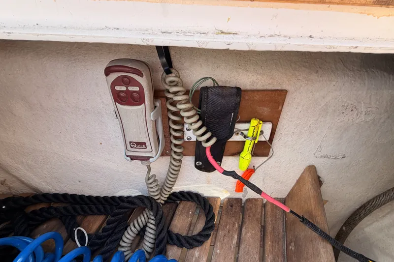 Slide: The Image of Control panel and ropes on a 2003 Farr 50 Pilot House yacht. - 27