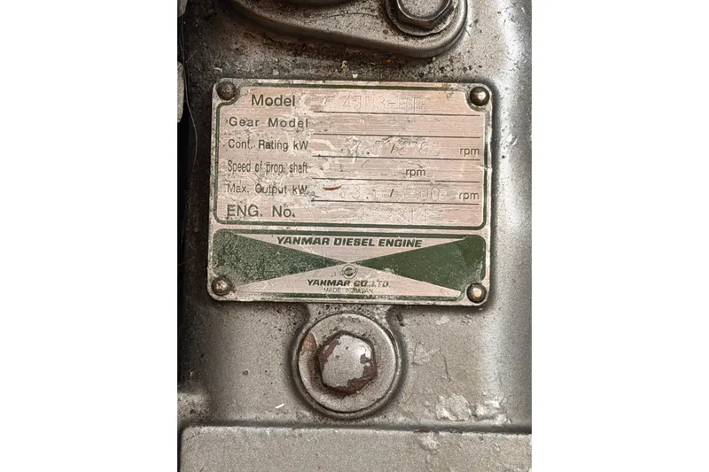 Slide: The Image of Yanmar diesel engine plate on a 2003 Farr 50 Pilot House sailboat. - 131