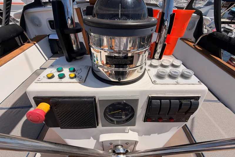 Slide: The Image of Control panel of a 2003 Farr 50 Pilot House yacht with navigation instruments. - 46