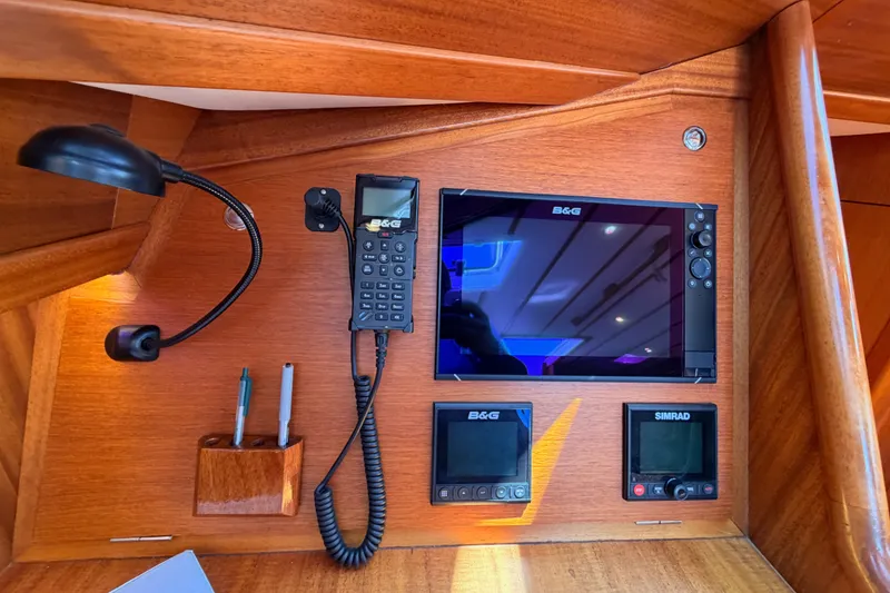 Slide: The Image of Control panel of a 2003 Farr 50 Pilot House yacht with navigation equipment. - 70