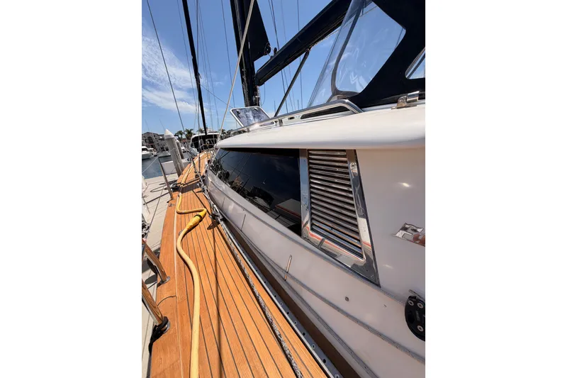 Slide: The Image of 2003 Farr 50 Pilot House yacht with sleek deck and modern design. - 20