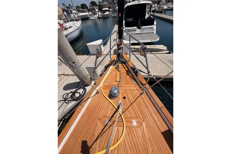 Slide: The Image of Deck view of 2003 Farr 50 Pilot House yacht docked at marina. - 24