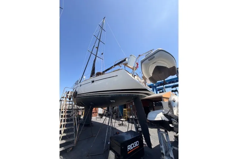 Slide: The Image of 2003 Farr 50 Pilot House sailboat on dry dock, viewed from below. - 140