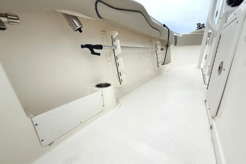 Slide: The Image of 2024 Key West 263 FS boat interior with rod holder and cup holder. - 32