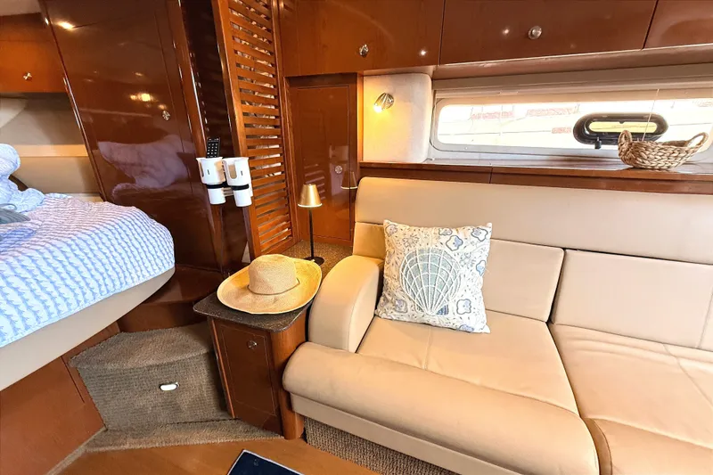Slide: The Image of Luxurious interior of 2013 Sea Ray Sundancer 370 yacht with cozy seating and elegant decor. - 27