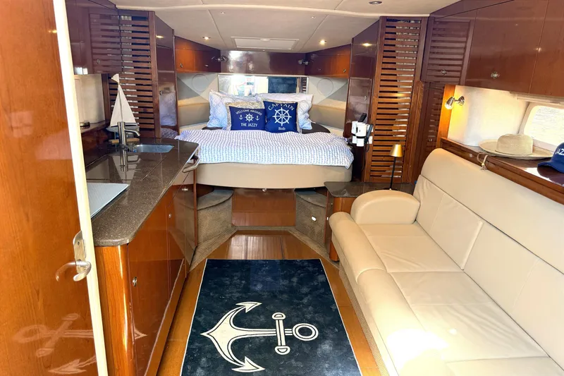 Slide: The Image of Luxurious interior of 2013 Sea Ray Sundancer 370 yacht with cozy bed and elegant seating. - 18