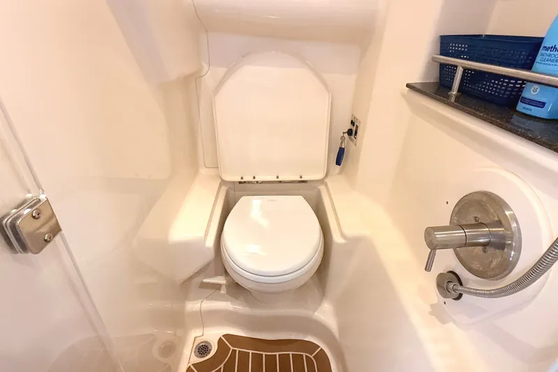 Slide: The Image of Compact bathroom in 2013 Sea Ray Sundancer 370 yacht with toilet and shower. - 36