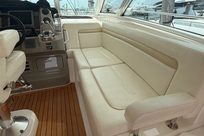 Slide: The Image of Luxurious interior of 2010 Sea Ray Sundancer 540 yacht with plush seating and sleek helm. - 21